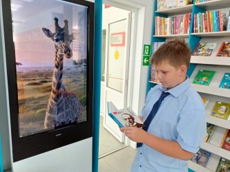 Книги, игры и караоке: новая библиотека уже покорила детские сердца 0